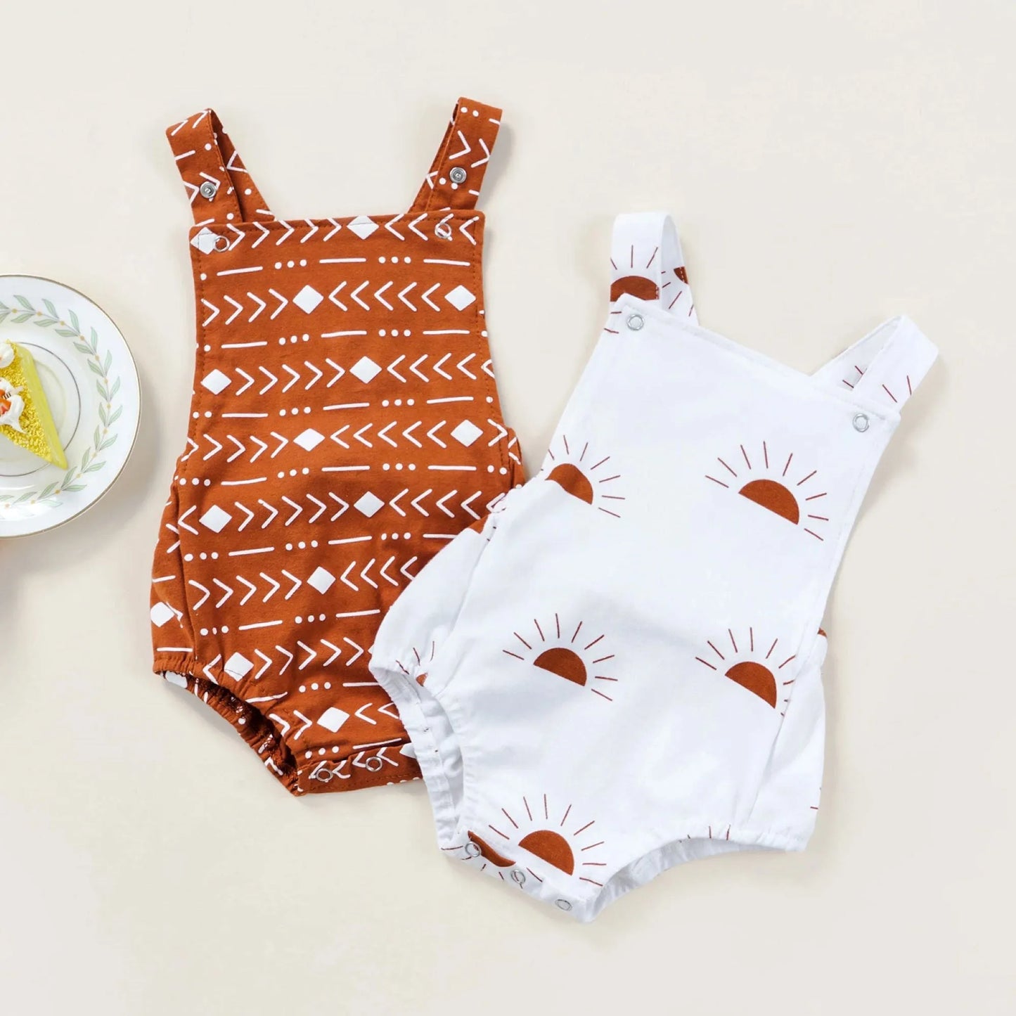 "BabZ-sleeveless rompers for baby boy-Boho printed baby romper set with vibrant sun and tribal patterns, perfect for stylish and comfortable wear."